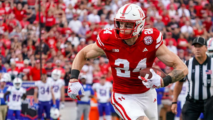 Sep 23, 2023; Lincoln, Nebraska, USA; Nebraska Cornhuskers tight end Thomas Fidone II (24) runs for a touchdown against the Louisiana Tech Bulldogs during the fourth quarter at Memorial Stadium.