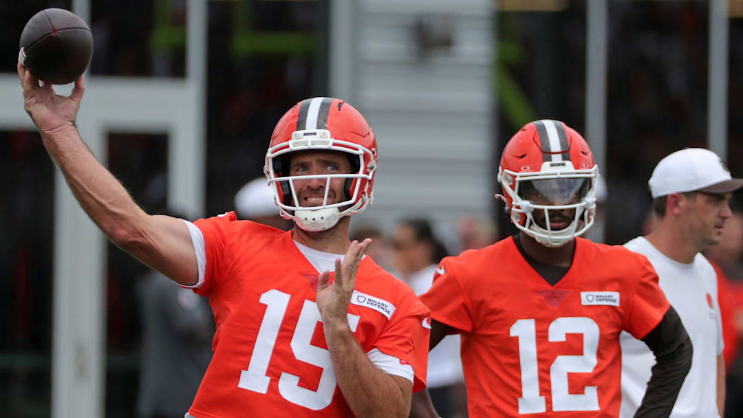 Joe Flacco throws as Shedeur Sanders looks on during Browns training camp July 25, 2025, in Berea, Ohio.