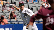 Mississippi State Bulldogs third baseman Ace Reese (3) fields a bunt by Texas A&M second baseman Ben Royo (10) but makes a wild throw to first in the first round of the SEC Baseball Tournament at the Hoover Met.