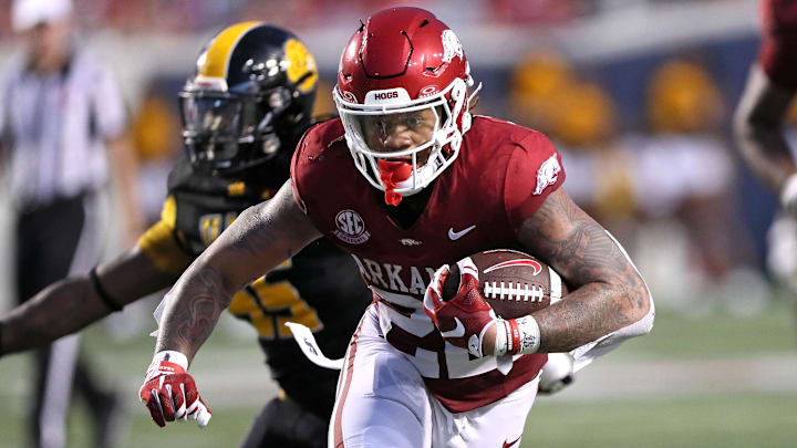 Arkansas Razorbacks running back Ja’Quinden Jackson (22) rushes during the second quarter against the Pine Bluff Golden Lions at War Memorial Stadium. Arkansas Razorbacks running back Ja’Quinden Jackson (22) rushes during the second quarter against the Pine Bluff Golden Lions at War Memorial Stadium.