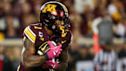Oct 17, 2025; Minneapolis, Minnesota, USA; Minnesota Golden Gophers running back Darius Taylor (1) runs the ball against the Nebraska Cornhuskers during the second half at Huntington Bank Stadium. Mandatory Credit: Matt Krohn-Imagn Images