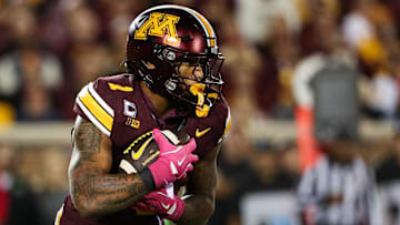 Oct 17, 2025; Minneapolis, Minnesota, USA; Minnesota Golden Gophers running back Darius Taylor (1) runs the ball against the Nebraska Cornhuskers during the second half at Huntington Bank Stadium. Mandatory Credit: Matt Krohn-Imagn Images