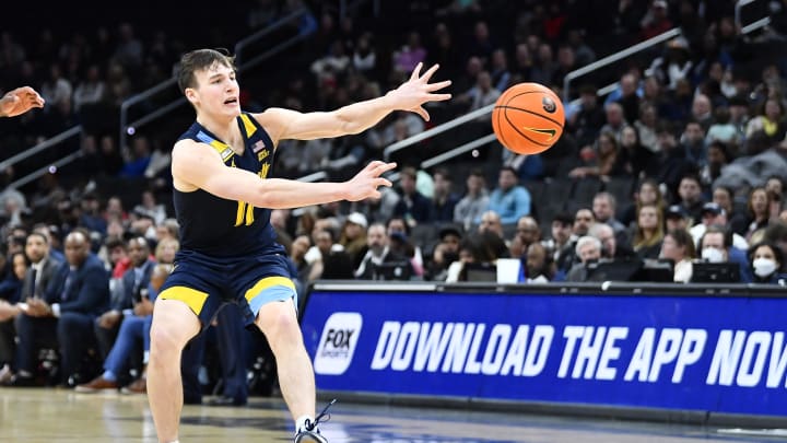 Feb 11, 2023; Washington, District of Columbia, USA; Marquette Golden Eagles guard Tyler Kolek (11) passes against the Georgetown Hoyas during the second half at Capital One Arena. Mandatory Credit: Brad Mills-USA TODAY Sports