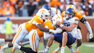 Tennessee defensive lineman Joshua Josephs (19) and Tennessee linebacker Jalen Smith (39) sack UTEP quarterback JP Pickles (19) during a NCAA football game between Tennessee and UTEP in Neyland Stadium on Saturday, November 23, 2024.