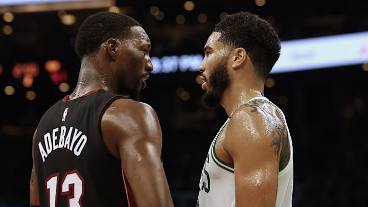 Oct 27, 2023; Boston, Massachusetts, USA; Miami Heat center Bam Adebayo (13) talks with Boston Celtics forward Jayson Tatum (0) during the second quarter at TD Garden. Mandatory Credit: Winslow Townson-Imagn Images