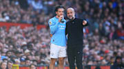 Jack Grealish und Pep Guardiola im Gespräch