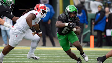 Oregon running back Noah Whittington carries the ball as the Oregon Ducks host the Indiana Hoosiers Oct. 11, 2025, at Autzen Stadium in Eugene, Oregon.