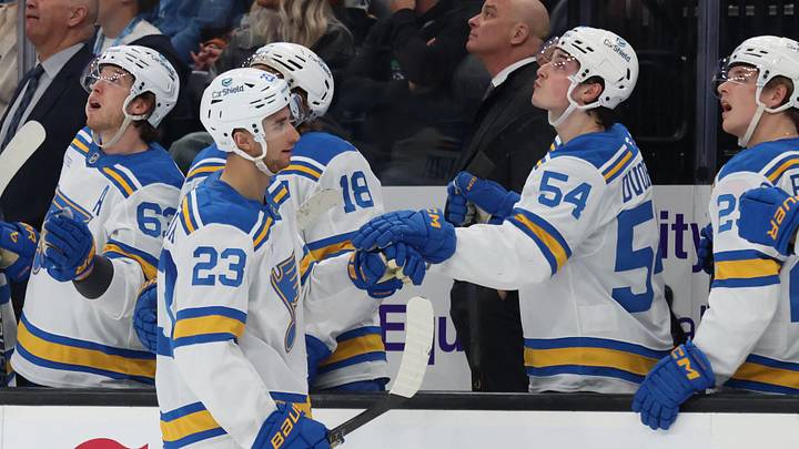 Apr 16, 2026; Salt Lake City, Utah, USA; St. Louis Blues defenseman Logan Mailloux (23) celebrates with teammates after scoring the go ahead goal against the Utah Mammoth during the third period at Delta Center. Mandatory Credit: Rob Gray-Imagn Images