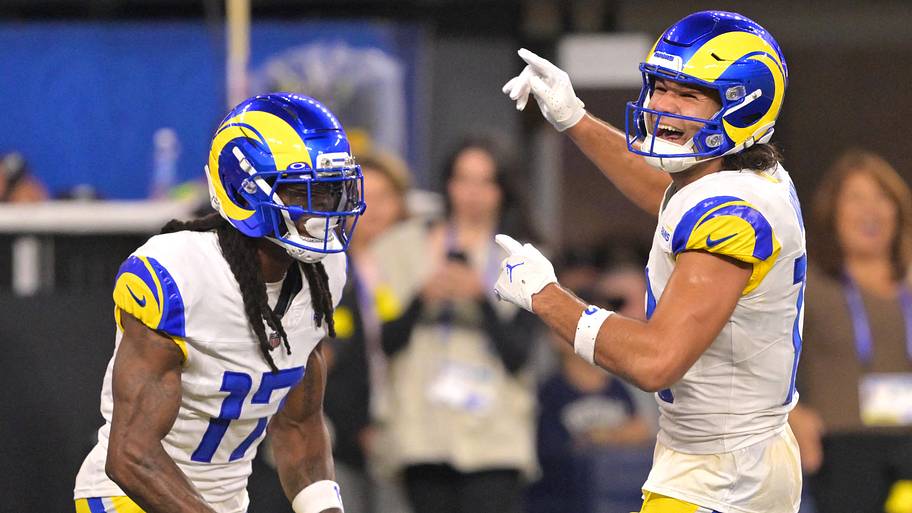 Davante Adams and Puka Nacua celebrate after a play.
