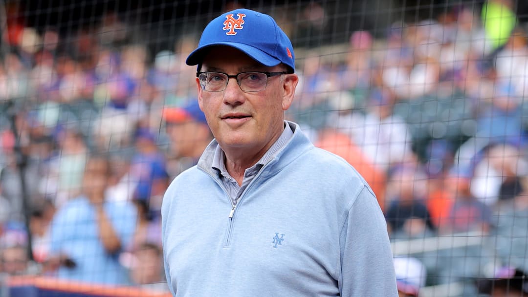 Aug 14, 2025; New York City, New York, USA; New York Mets owner Steve Cohen stands on the field before a ceremony to honor first baseman Pete Alonso (not pictured) for breaking the Mets all time home run record before a game against the Atlanta Braves at Citi Field. Mandatory Credit: Brad Penner-Imagn Images