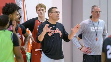 Bradley head coach Brian Wardle and associate head coach Mike Bargen, far right, coach the Braves during practice Monday, Oct. 2, 2023 at Renaissance Coliseum in Peoria.
