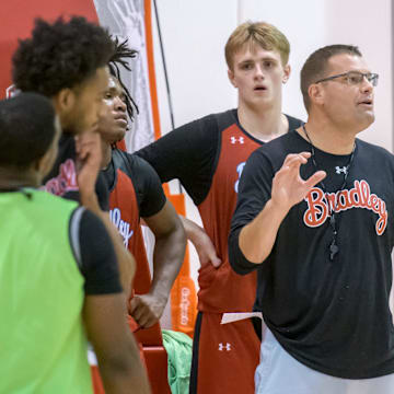 Former Bradley associate head coach Mike Bargen (right)  has been hired by Indiana as a special assistant to Darian DeVries.