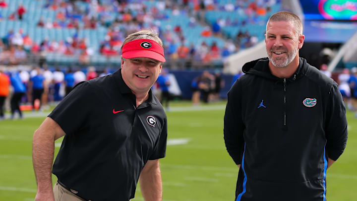 Georgia Bulldogs head coach Kirby Smart and Florida Gators head coach Billy Napier talk before the game before the first half at EverBank Stadium in Jacksonville, FL on Saturday, November 2, 2024. [Doug Engle/Gainesville Sun]