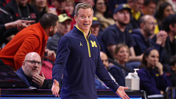Michigan Wolverines coach Dusty May reacts to a call during the second half of a game against the Rutgers Scarlet Knights.