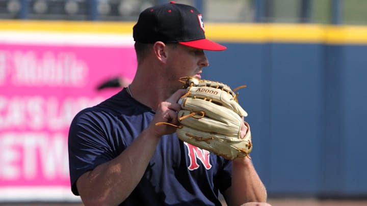 Milwaukee Brewers prospect Craig Yoho plays catch before a game at First Horizon Park while with the Nashville Sounds.