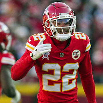 Dec 21, 2024; Kansas City, Missouri, USA; Kansas City Chiefs cornerback Trent McDuffie (22) celebrates after an interception during the first half against the Houston Texans at GEHA Field at Arrowhead Stadium. Mandatory Credit: Jay Biggerstaff-Imagn Images