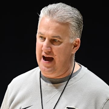 Purdue Boilermakers head coach Matt Painter instructs his players