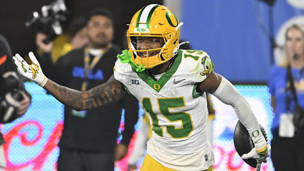 Oregon Ducks wide receiver Tez Johnson (15) celebrates scoring a touchdown the fourth quarter against the UCLA Bruins