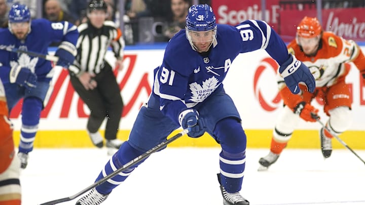 Dec 12, 2024; Toronto, Ontario, CAN; Toronto Maple Leafs forward John Tavares (91) skates against the Anaheim Ducks during the first period at Scotiabank Arena. Mandatory Credit: John E. Sokolowski-Imagn Images Dec 12, 2024; Toronto, Ontario, CAN; Toronto Maple Leafs forward John Tavares (91) skates against the Anaheim Ducks during the first period at Scotiabank Arena. Mandatory Credit: John E. Sokolowski-Imagn Images