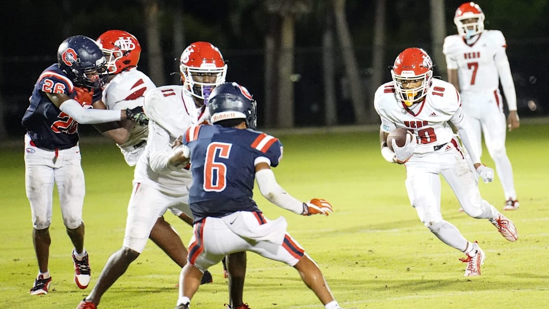 Vero Beach wide receiver Xavier Stinson gains yardage after the catch against Centennial during a high school football game on Thursday, September 12, 2024 at South County Stadium in Port St. Lucie.