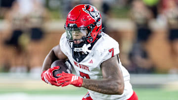 Sep 11, 2025; Winston-Salem, North Carolina, USA;  North Carolina State Wolfpack tight end Justin Joly (7) catches a pass against the Wake Forest Demon Deacons in the second half at Allegacy Federal Credit Union Stadium. Mandatory Credit: Luke Jamroz-Imagn Images