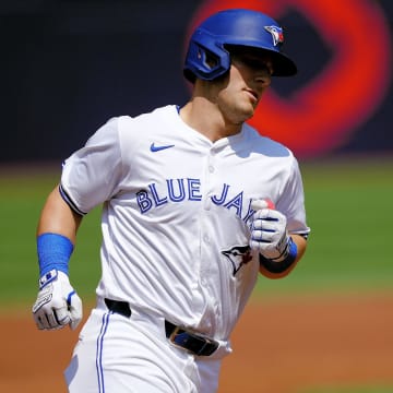 Toronto Blue Jays left fielder Daulton Varsho (25) heads for home on his two run home run against the Texas Rangers during the first inning at Rogers Centre on July 28.