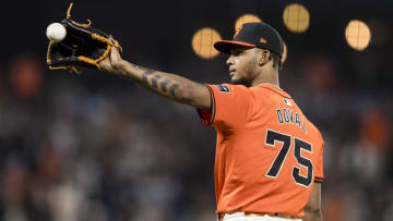 Jul 12, 2024; San Francisco, California, USA; San Francisco Giants closing pitcher Camilo Doval (75) prepares to throw against the Minnesota Twins during the ninth inning at Oracle Park.