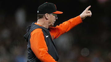 Sep 27, 2024; San Francisco, California, USA; San Francisco Giants manager Bob Melvin calls for a relief pitcher during the fourth inning against the St. Louis Cardinals at Oracle Park