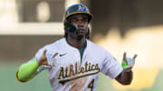 Oakland Athletics outfielder Lawrence Butler (4) celebrates after hitting a solo home run during the third inning against the Houston Astros at Oakland-Alameda County Coliseum on July 23.