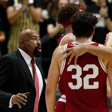 Indiana coach Mike Woodson talks to his players during a timeout at Purdue on Saturday, Feb. 25, 2023, at Mackey Arena. 