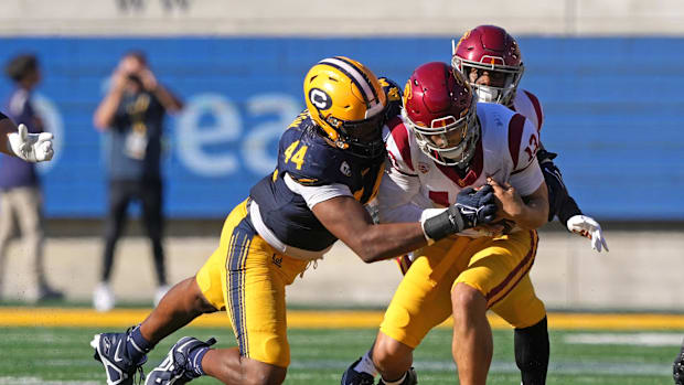 California Golden Bears linebacker Xavier Carlton (44) sacks USC Trojans quarterback Caleb Williams