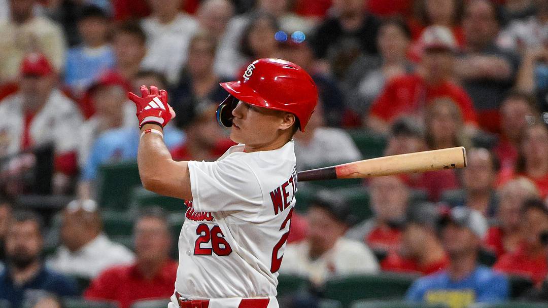 May 4, 2026; St. Louis, Missouri, USA; St. Louis Cardinals second baseman JJ Wetherholt (26) hits a one run single against the Milwaukee Brewers during the eighth inning at Busch Stadium. Mandatory Credit: Jeff Curry-Imagn Images