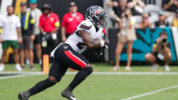 Sep 21, 2025; Jacksonville, Florida, USA; Houston Texans running back Woody Marks (27) runs with the the ball during the seco