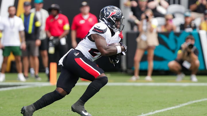 Sep 21, 2025; Jacksonville, Florida, USA; Houston Texans running back Woody Marks (27) runs with the the ball during the second quarter against the Jacksonville Jaguars at EverBank Stadium. Mandatory Credit: Travis Register-Imagn Images Sep 21, 2025; Jacksonville, Florida, USA; Houston Texans running back Woody Marks (27) runs with the the ball during the second quarter against the Jacksonville Jaguars at EverBank Stadium. Mandatory Credit: Travis Register-Imagn Images