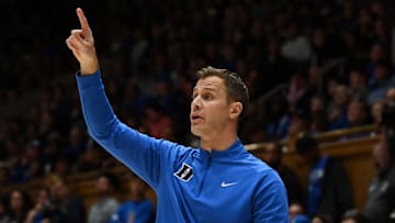 Nov 14, 2025; Durham, North Carolina, USA; Duke Blue Devils head coach Jon Scheyer directs his team during the second half against the Indiana State Sycamores at Cameron Indoor Stadium. Mandatory Credit: Rob Kinnan-Imagn Images