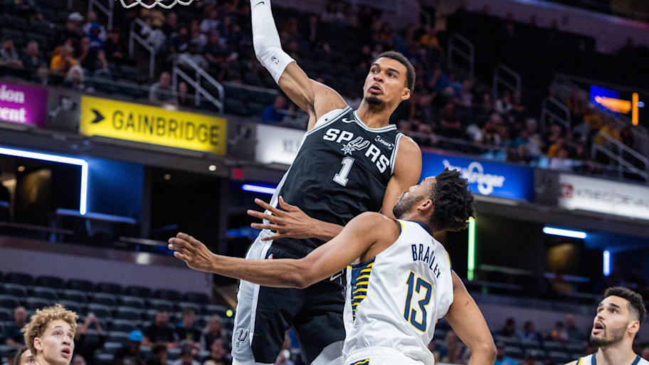 Spurs forward/center Victor Wembanyama (1) shoots the ball over Indiana Pacers center/forward Tony Bradley