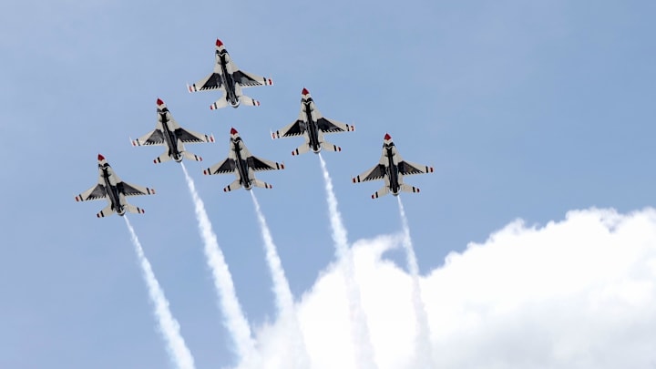 The U.S. Air Force Thunderbirds fly over the track Friday, May 24, 2024, during Carb Day ahead of the 108th running of the Indianapolis 500 at Indianapolis Motor Speedway.