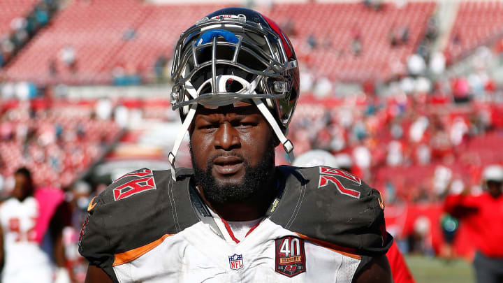 Oct 11, 2015; Tampa, FL, USA; Tampa Bay Buccaneers tackle Gosder Cherilus (78) walks to the locker room after an NFL football game against the Jacksonville Jaguars at Raymond James Stadium. Tampa won 38-31. Mandatory Credit: Reinhold Matay-USA TODAY Sports