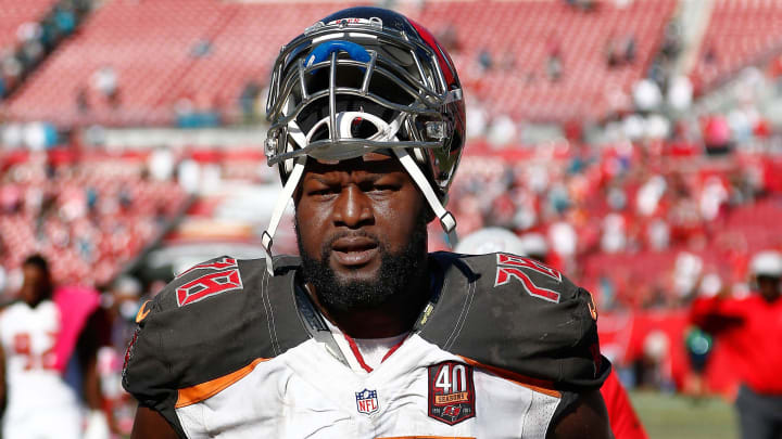 Oct 11, 2015; Tampa, FL, USA; Tampa Bay Buccaneers tackle Gosder Cherilus (78) walks to the locker room after an NFL football game against the Jacksonville Jaguars at Raymond James Stadium. Tampa won 38-31. Mandatory Credit: Reinhold Matay-USA TODAY Sports