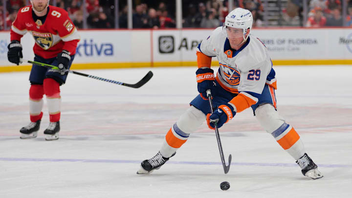 Feb 2, 2025; Sunrise, Florida, USA; New York Islanders center Brock Nelson (29) moves the puck against the Florida Panthers during the first period at Amerant Bank Arena. Mandatory Credit: Sam Navarro-Imagn Images Feb 2, 2025; Sunrise, Florida, USA; New York Islanders center Brock Nelson (29) moves the puck against the Florida Panthers during the first period at Amerant Bank Arena. Mandatory Credit: Sam Navarro-Imagn Images