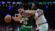 May 7, 2025; Boston, Massachusetts, USA; New York Knicks forward OG Anunoby (8) defends against Boston Celtics forward Jayson Tatum (0) in the fourth quarter during game two of the second round for the 2025 NBA Playoffs at TD Garden. Mandatory Credit: David Butler II-Imagn Images
