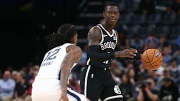 Oct 30, 2024; Memphis, Tennessee, USA; Brooklyn Nets guard Dennis Schroder (17) dribbles as Memphis Grizzlies guard Ja Morant (12) defends during the first half at FedExForum. Mandatory Credit: Petre Thomas-Imagn Images