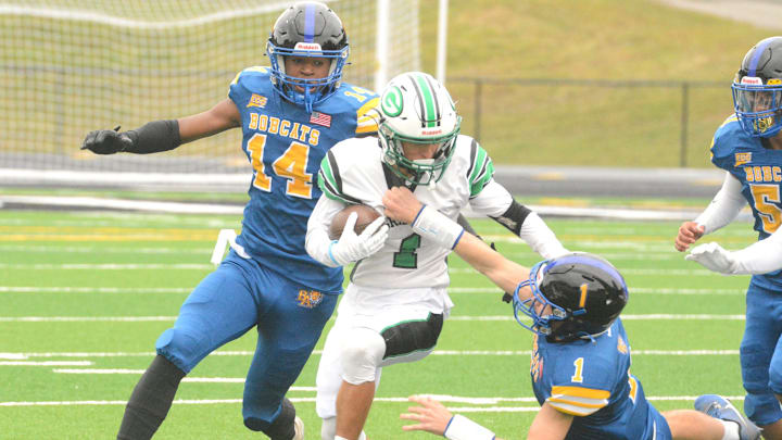 Mason Leak (14), pictured here competing for the Bacon Academy varsity football team last season, transferred to Avon Old Farms to finish his high school career. Mason Leak (14), pictured here competing for the Bacon Academy varsity football team last season, transferred to Avon Old Farms to finish his high school career.