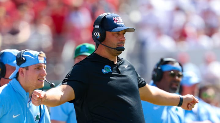 Sep 14, 2024; Norman, Oklahoma, USA;  Tulane Green Wave head coach Jon Sumrall reacts during the first half against the Oklahoma Sooners at Gaylord Family-Oklahoma Memorial Stadium.