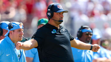 Sep 14, 2024; Norman, Oklahoma, USA;  Tulane Green Wave head coach Jon Sumrall reacts during the first half against the Oklahoma Sooners at Gaylord Family-Oklahoma Memorial Stadium. 