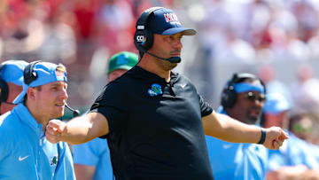 Sep 14, 2024; Norman, Oklahoma, USA;  Tulane Green Wave head coach Jon Sumrall reacts during the first half against the Oklahoma Sooners at Gaylord Family-Oklahoma Memorial Stadium. 