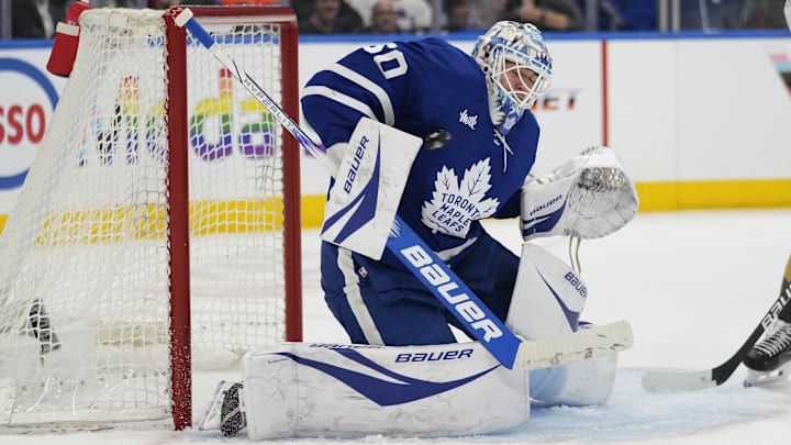 Nov 20, 2024; Toronto, Ontario, CAN; Toronto Maple Leafs goaltender Joseph Woll (60) makes a save against the Vegas Golden Knights during the second period at Scotiabank Arena. Mandatory Credit: John E. Sokolowski-Imagn Images