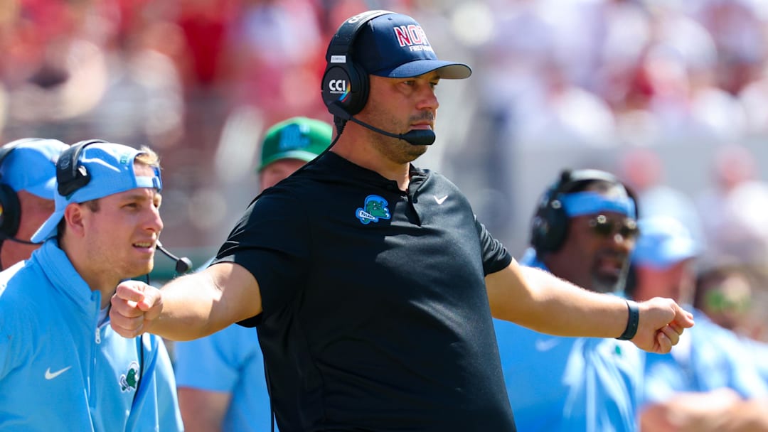 Sep 14, 2024; Norman, Oklahoma, USA;  Tulane Green Wave head coach Jon Sumrall reacts during the first half against the Oklahoma Sooners at Gaylord Family-Oklahoma Memorial Stadium. Mandatory Credit: Kevin Jairaj-Imagn Images