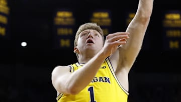 Dec 29, 2024; Ann Arbor, Michigan, USA;  Michigan Wolverines center Danny Wolf (1) shoots in the first half against the Western Kentucky Hilltoppers at Crisler Center. Mandatory Credit: Rick Osentoski-Imagn Images