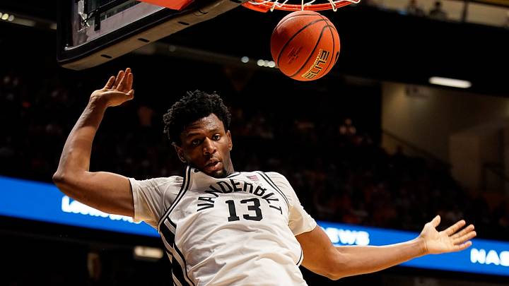 Vanderbilt forward Jalen Washington (13) dunks against Tennessee during the second half at Memorial Gym in Nashville, Tenn., Saturday, Feb. 21, 2026.